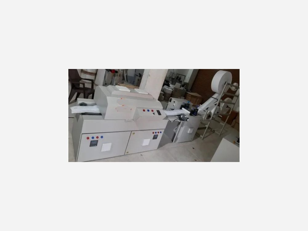 Conveyor Type Sanitary Pad Making Machine